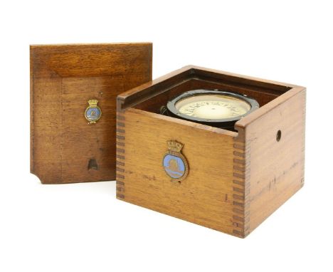 Ship's compass in mahogany box, with badges R.N.W.S.