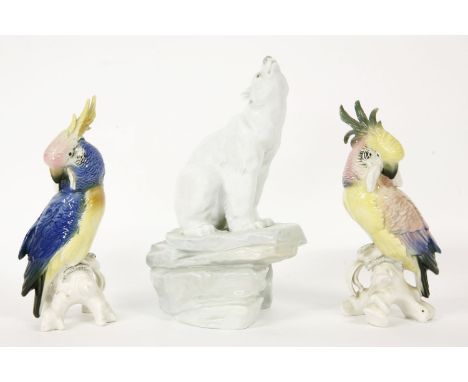 A pair of porcelain cockatoos, by Karl Ens, each 20cm tall, together with a Nao polar bear