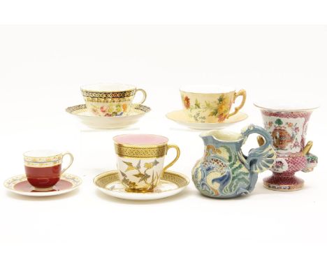 A collection of various Royal Worcester and other tea wares, including a pair of urns