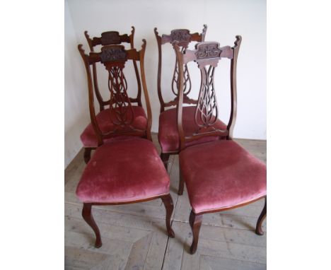 Set of four Art Nouveau style mahogany dining chairs with upholstered seats 