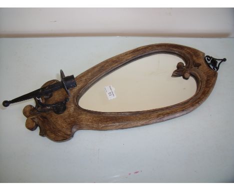 Wooden framed Art Nouveau style wall mirror with single wrought metal candle sconce 