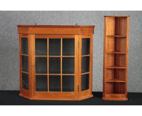 A contemporary pine wall cabinet along with a similar CD rack and corner cupboard. H.69 W.74 D.18cm. 