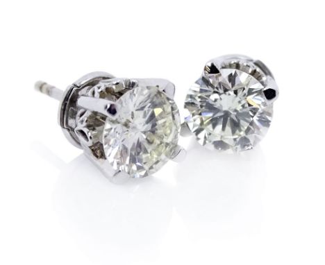 Circa 1950s Approx. 2.25 Carat Round Brilliant Cut Diamond and 14 Karat White Gold Ear Studs. Diamonds K-L color, SI1 clarity