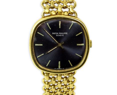 Man's Vintage Patek Philippe Golden Ellipse Ref. 3738/6J 18 Karat Yellow Gold Bracelet Watch with Blue Dial, Manual Movement.