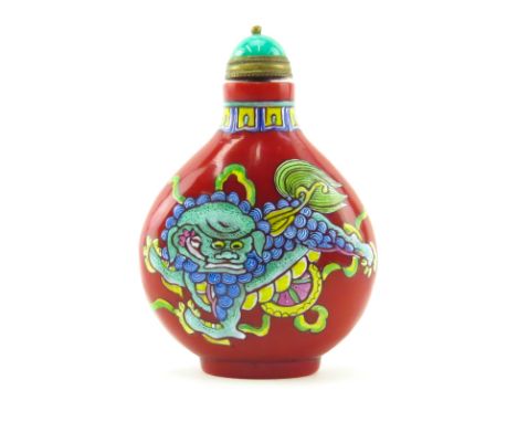 Antique Chinese Peking Glass and Enamel Snuff Bottle. Enamel painted foo dog motif on front and obverse side. signed. Good co