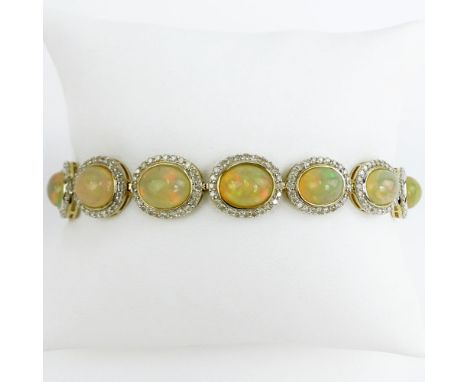 AIG Certified 18.94 Carat Oval Shaped Cabochon Opal, 3.25 Carat Round Brilliant Cut Diamond and 14 Karat Yellow Gold Bracelet