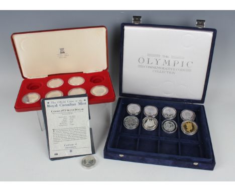 An Elizabeth II Pobjoy Mint Silver Jubilee 1977 part coin set, cased, five Turks and Caicos Islands twenty crowns coins and f