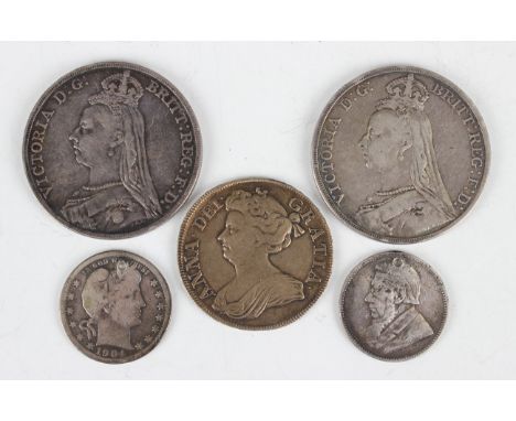 An Anne half-crown 1712, edge detailed 'Undecimo', and a small group of other coins, including two Victoria crowns, 1887 and 