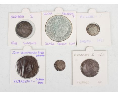 A small group of Elizabeth I hammered silver coinage, comprising a milled issue sixpence 1562, a hammered shilling, mintmark 