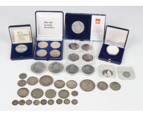 A group of European silver and commemorative coinage, the majority German, including a four-coin set commemorating the Munich