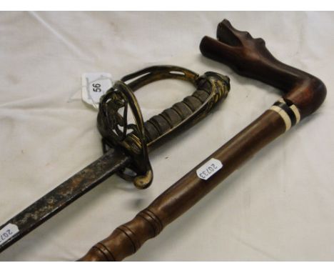 A Victorian cavalry sword and a walking stick with animal head handle.