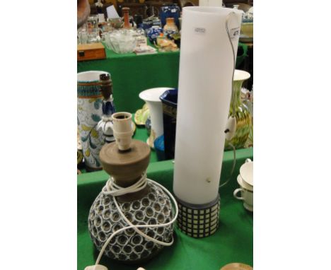 A Poole Pottery cylindrical table lamp and a Poole Pottery table lamp with incised decoration, (2).