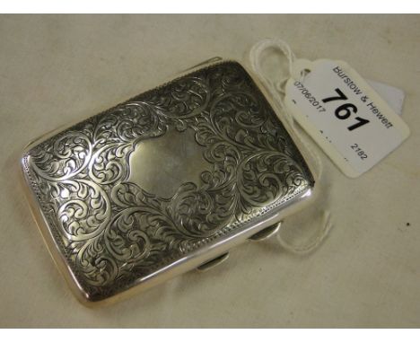 An engraved silver cigarette case, 59g.