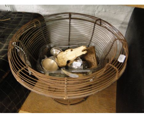 A wire basket containing a horse's head stick handle, plated eggcups, etc.