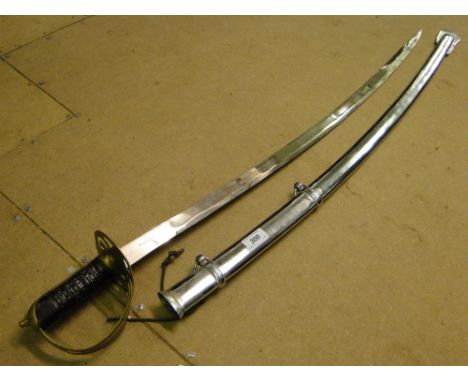 A reproduction sword in polished steel scabbard.