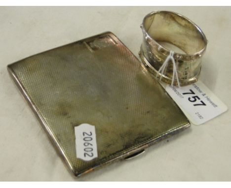 An engine turned silver cigarette case and a silver napkin ring, 4.7oz.