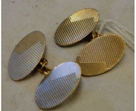 A pair of 9ct gold engraved cufflinks 6.6g.