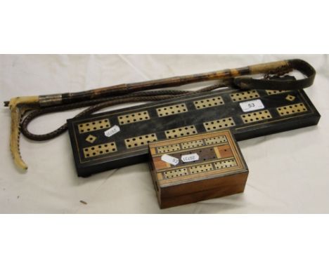 2 Inlaid cribbage boards and a horn handled riding whip.