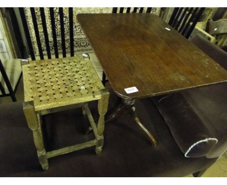 A George III oak tilt top tripod table and a small oak rush seated stool.