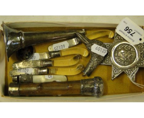 A silver hunting medallion, silver mounted cane handle, baby's whistle, etc.