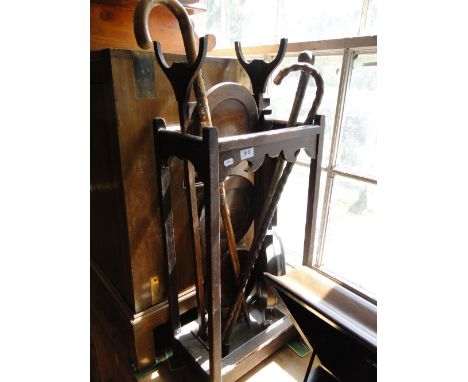 A stained pine stick stand, 3-tier folding cake stand, barometer, silver mounted cane, etc.