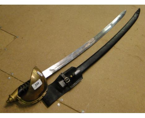 A reproduction sword in leather scabbard.