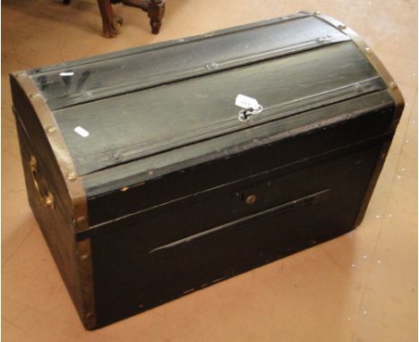 A painted pine domed top trunk with brass mounts, fire irons, trap, etc.