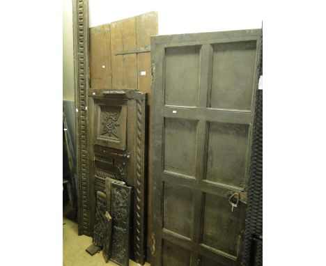 Antique oak plank construction door, overmantel, trough, 2 carved doors, several parts of a frieze & 4 other carved oak panel