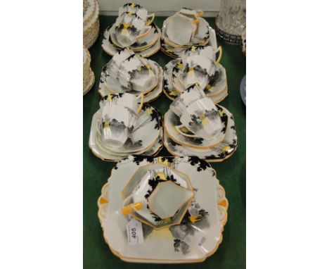 Circa 1930 Art Deco Shelley tea service for 12 people with sunset garden design, pattern no. 11678, registration no. 723404.