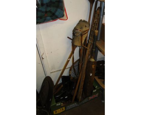 Vintage sporting goods including cricket bat, Le Croix stick, etc.