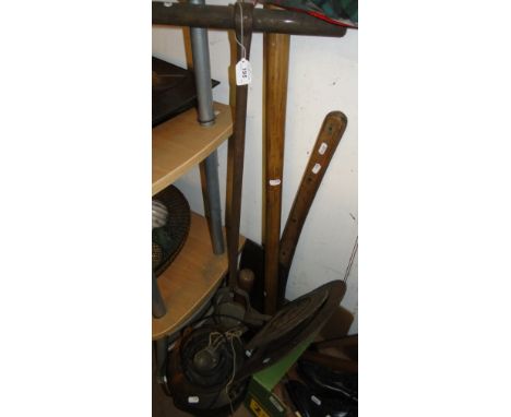 An axe, various tools, iron pots, etc.