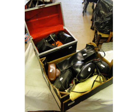 A Nikon F3 camera, Zenit camera, Agfa camera and various lenses.