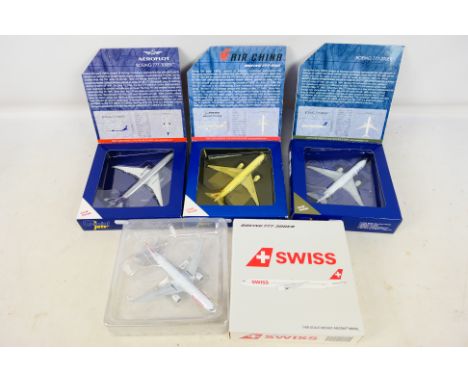 Gemini Jets - 4 x boxed aircraft in 1:400 scale, a 777-300ER in Swiss livery, a 777-200ER in United livery, a 777-200 in Air 