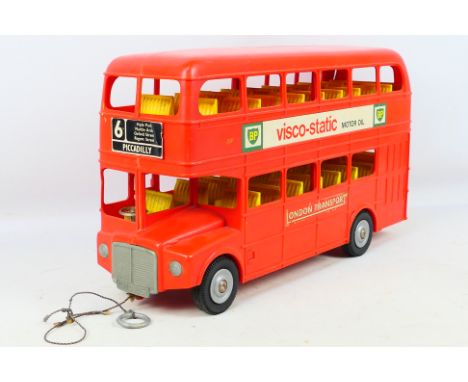 Tudor Rose - An unboxed Tudor Rose large plastic pull-along Routemaster Bus. The model measures approximately 43cms in length