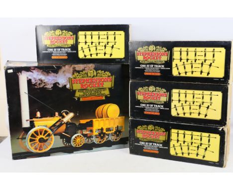 Hornby - A boxed G100 3 1/2 inch gauge Stephensons Rocket Real Steam Train Set with 4 boxes of G102 3 1/2 inch gauge track. T