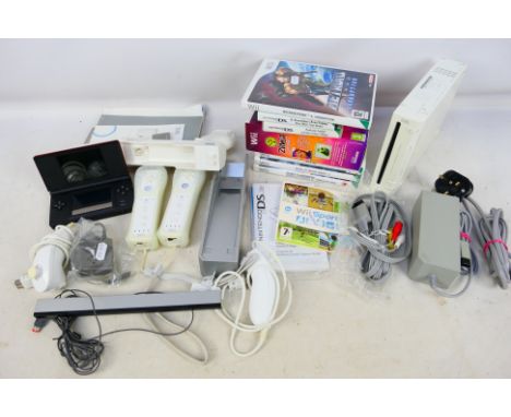 Nintendo - Wii console, controllers, power cable, accessories and games together with a Nintendo DS handheld console with lea