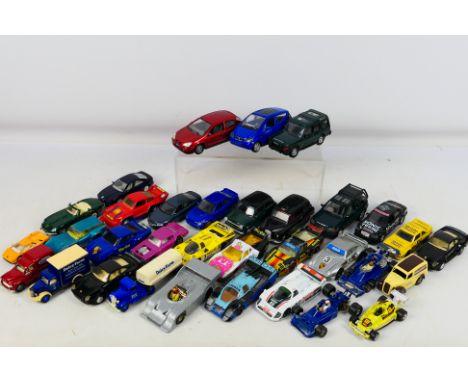 Matchbox - Corgi - Maisto - Welly - A group of unboxed vehicles including Subaru Impreza WRX STi, Audi A8, Mini Cooper, Land 