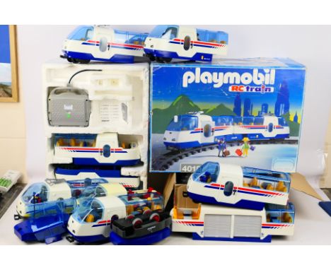 Playmobil - A large mixed assortment of Playmobil train related items to include and incomplete G scale 4018 train set and va
