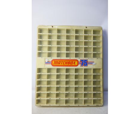 Matchbox - A vintage Matchbox 75 Shop Wall Display Unit with space for 77 x models. It measures approximately 74 cm x 61 cm. 