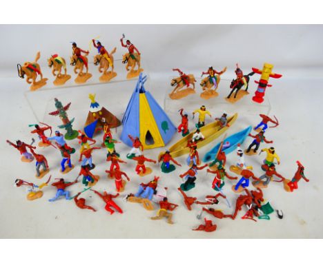 Timpo - An assortment of approximately 50 loose Timpo Indian figures with accessories including horses, boats and tents. Item