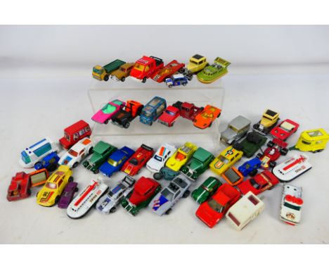 Matchbox - Corgi - Majorette - An assortment of approximately 40 diecast cars to include #40 Vauxhall Guildsman, #8 Tomaso Pa