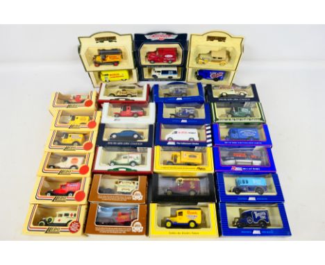 Lledo - 30 boxed diecast vehicles to include 73001 1955 VW Kombi Van 'Boch', #72000 1952 VW Beetle Blue Beetle, #DG85000 1912