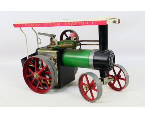 Mamod - Steam Tractor. No box. Appears in reasonably good, used condition but front axle is loose from the main chassis and n