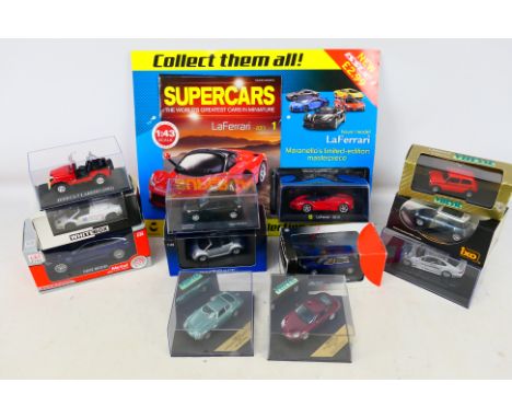 Ixo - Vitesse - Autoart - J-Collection - A group of boxed cars in 1:43 scale including Mini Cooper S, AMG Mercedes GT, Jeep C