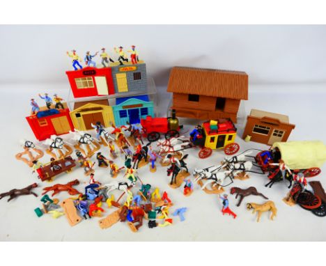 Timpo - A quantity of loose Timpo Cowboy figures and accessories including Stage coaches, Buildings and horses. Items appear 