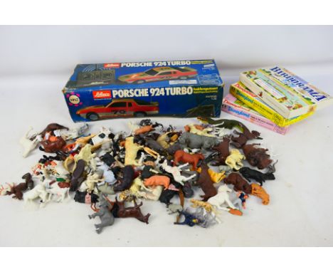 Britains - Schuco - Disney - An assortment of plastic Britains animal figures including horses, cows, pigs and others. Also s