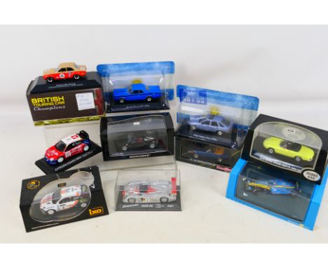 A job lot of ten 1:43 scale diecast model motor cars, various makers, predominantly in rigid perspex cases, all appear ex or 