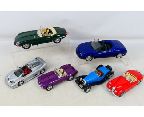 Burago and Maisto - A mixed collection of six Burago and Maisto diecast 1/18 and 1/24 scale models, including Bugatti, Jaguar