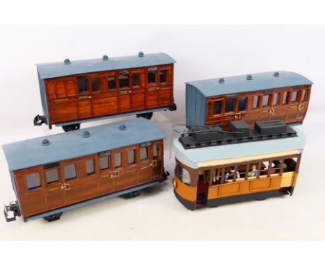 Trams - 4 unboxed G scale items to include an unbranded metal tram car with passengers and 3 scratch built teak style coaches