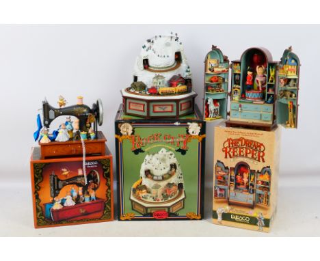 Enesco - 3 boxed musical items. Includes 562491 The Dream Keeper, 569682 Sew Petite and 555843 Rock City. Item appear to be i